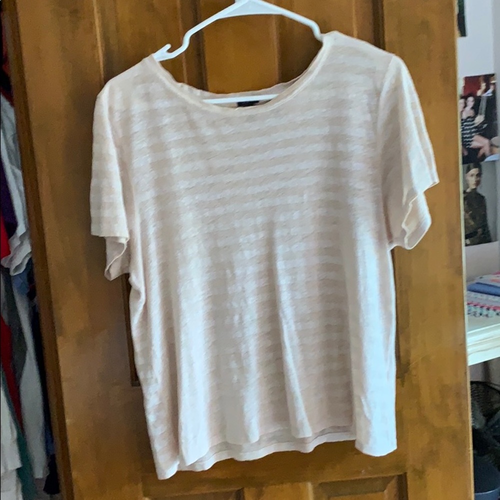 a white and cream stripped shirt